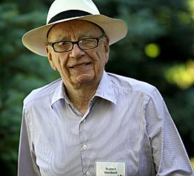 Rupert Murdoch arrives in London to take charge of the phone hacking scandal at News of the World (Image: Getty)