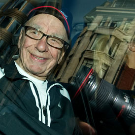 News Corp chief Rupert Murdoch leaves his London home on July 11, 2011. (Getty)