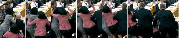 Rupert Murdoch's wife Wendi Deng fights off an intruder with a foam pie. 