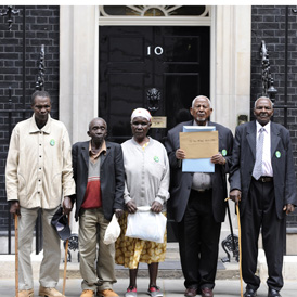 (L-R), Ndiku Mutua, Paulo Nzili, Jane Muthoni Mara, General Secretary of the Mau Mau association Gitu Wa Kahengeri and Wambugu Wa Nyingi stand in front of 10 Downing Street in 2009 (Reuters)