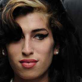Tributes to Amy Winehouse as port-mortem due (Reuters)