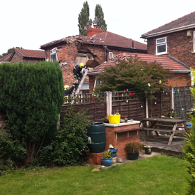 Light aircraft hits two houses in Salford (picture courtesy of Greater Manchester Fire and Rescue service)