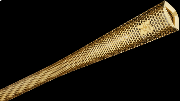 The London 2012 Olympic torch is a curved triangular aluminium tube.