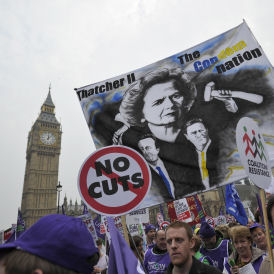 Public sector workers protest against cuts (Reuters)