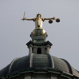 The scales of justice above the Old Bailey in London (Getty)