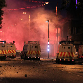 Policewoman and photographer injured in Belfast riots - Reuters
