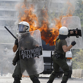 Greece passes austerity measures amid chaotic rioting - reuters