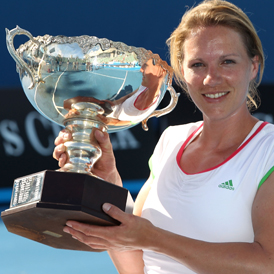 Esther Vergeer of the Netherlands poses with the trophy after winning the Women's Wheelchair singles at the 2011 Australian Open (Reuters)