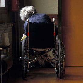 Elderley woman in wheelchair. (Getty)