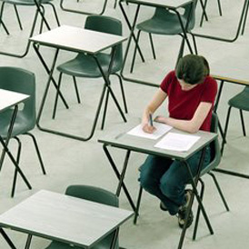 A pupil sits an exam (Getty)