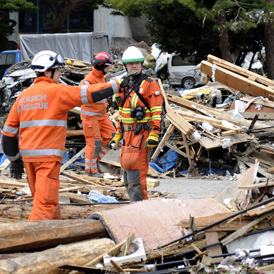 British search and rescue teams are digging through debris to find survivors.