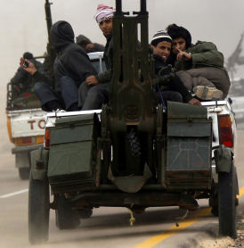 Rebel forces in Libya are preparing fight Gaddafi's army (Reuters)
