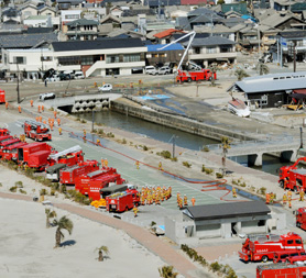 Fire trucks preparing to head to the Fukushima plant (R)