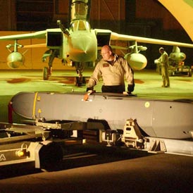 A Storm Shadow missile being prepared for use in Operation Telic 2003 (Reuters)
