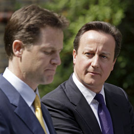 David Cameron and Nick Clegg at their coalition news conference (Reuters)