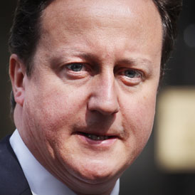 David Cameron defends the Coalition record (Getty)