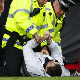 Fan arrested for attacking Celtic boss Neil Lennon - Reuters