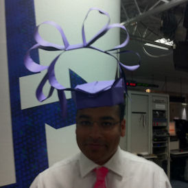 Krishnan Guru-Murthy models the Royal Wedding hat - the origami version