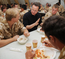 Prime Minister David Cameron speaks to British forces at Camp Bastion in Helmand Province (Reuters)