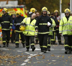 Salford explosion: emergency services search collapsed homes. (Reuters)