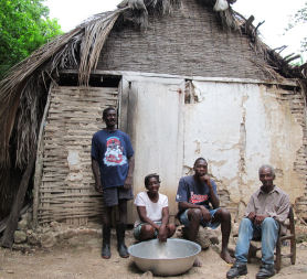 Residents in transitional shelter (Medair / Emma Le Beau)