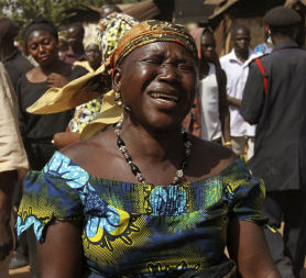 Woman mourning in Jos, Nigeria (credit:Reuters)