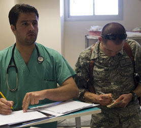 Coalition forces work with and train Afghan military medical staff (ISAF)
