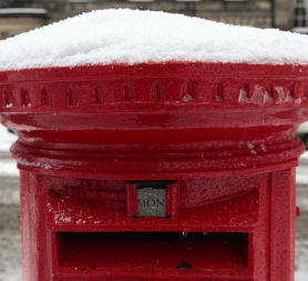 Snow on a postbox. Temperatures reached a record low in Wales overnight (credit:Reuters)