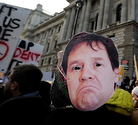 A protester wears a Nick Clegg mask during a tuition fees demo (Reuters)