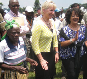 UN representative Margot Wallstrom dancing with the villagers 