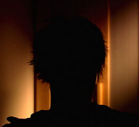 The silhouette of a woman 'Anna' who claims she was raped on a British armed forces base. 
