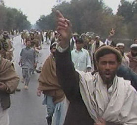 Local men in Jalalabad protest following the alleged Shinwar shootings (AP)