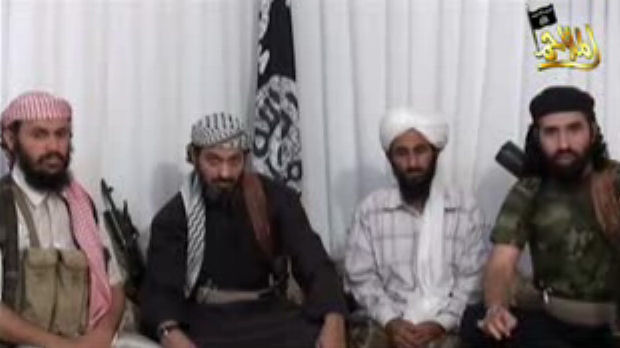 Leaders of al-Qaeda in Yemen appear in a video posted on Islamist websites. Their group has been linked to the explosives found on two cargo planes (credit:Reuters)