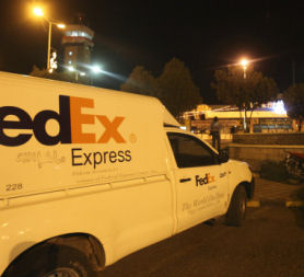 A FedEx van is seen at Yemen's Sana'a International Airport where two airplanes with explosives hidden in their cargo left enroute to the US (credit:Reuters)