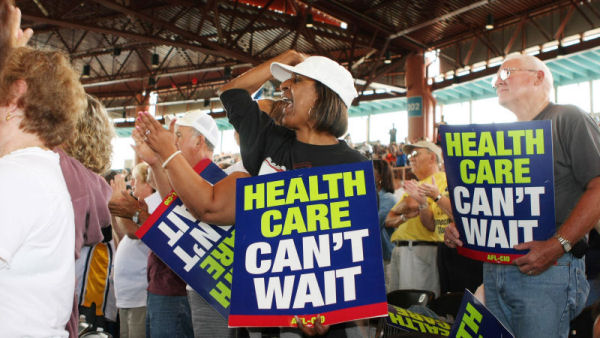 Healthcare protestors. Obama won a landmark battle to extend health insurance to millions of Americans in March 2010. (Getty)