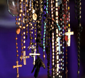 The crucifix symbolises the Catholic faith