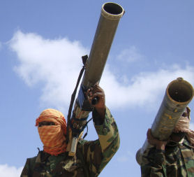 Members of al Shabaab Islamist rebel group hold their weapons in Somalia's capital Mogadishu (Reuters)