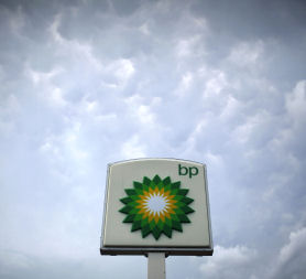 BP oil sign against stormy clouds