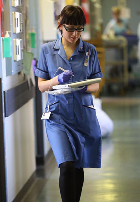 NHs reform: a nurse walks down a hospital corridor in Birmingham. (Getty)