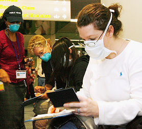 Travellers return from Mexico wearing face masks (credit:Getty Images)