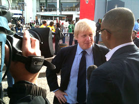 Boris Johnson talks to Keme Nzerem