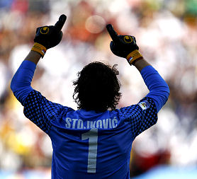 Serbia's goalkeeper Stojkovic gestures after he made a save during a 2010 World Cup Group D soccer match against Germany