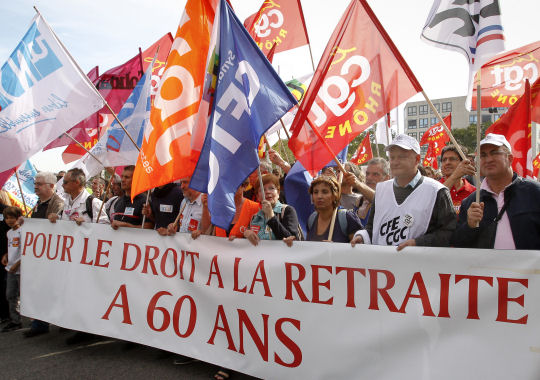 Public sector workers in Paris protest changes to pension laws