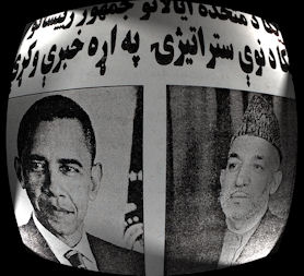 Barack Obama and Hamid Karzai appear side by side in an Afghan newspaper. (Credit: Getty)