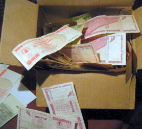 Zimbabwe money in a cardboard box