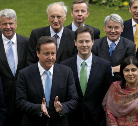 David Cameron, Nick Clegg and the new Con-Lib coalition Cabinet. (Credit: Reuters)