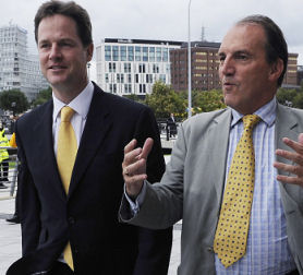 Deputy Prime Minister Nick Clegg launches the Liberal Democrat party conference in Liverpool with deputy leader Simon Hughes (Image: Reuters)