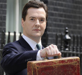 Chancellor George Osborne leaves Downing Street to present his first budget (credit:Reuters)