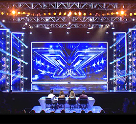 Judges at the X Factor auditions (Credit: ITV/Talkback Thames/Syco)
