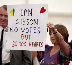 A Labour supporter holds a placard in support of former Labour Member of Parliament in the constituency Ian Gibson, at the Norwich North by-election (credit: Getty Images)